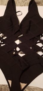 NWT Herve Leger black one piece with slight defect